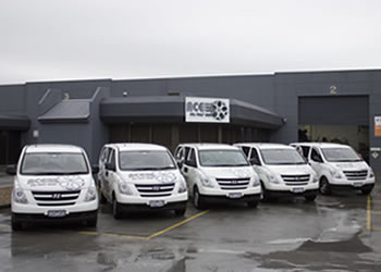 The Ace Alloys pickup and delivery van fleet parked outside the Mordialloc facility